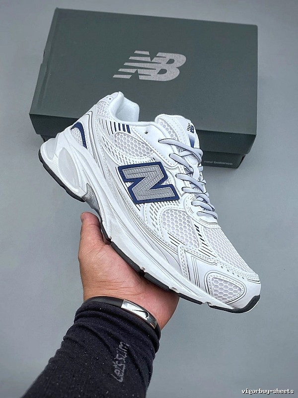 New Balance White and Navy Running Shoes Defined by Classic Running Profile